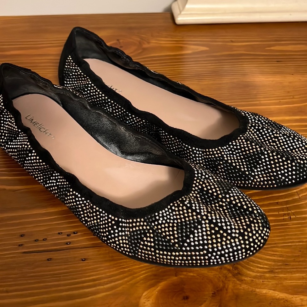 Flats with little metal beads.  Very cute with jeans, etc.
